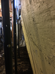 Install I-Beam Restraint to fix tipping wall